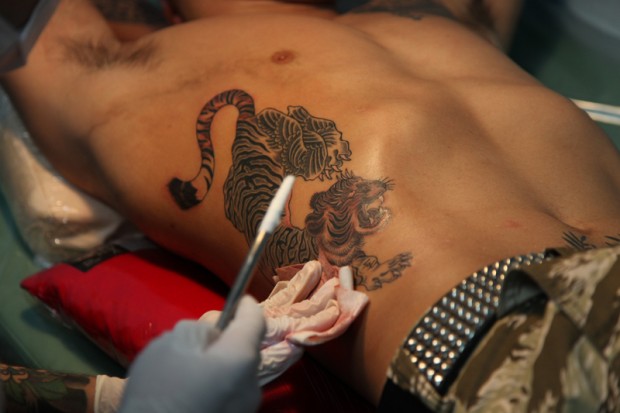 Japanese MMA fighters are allowed to have tattoos but they aren't allowed 